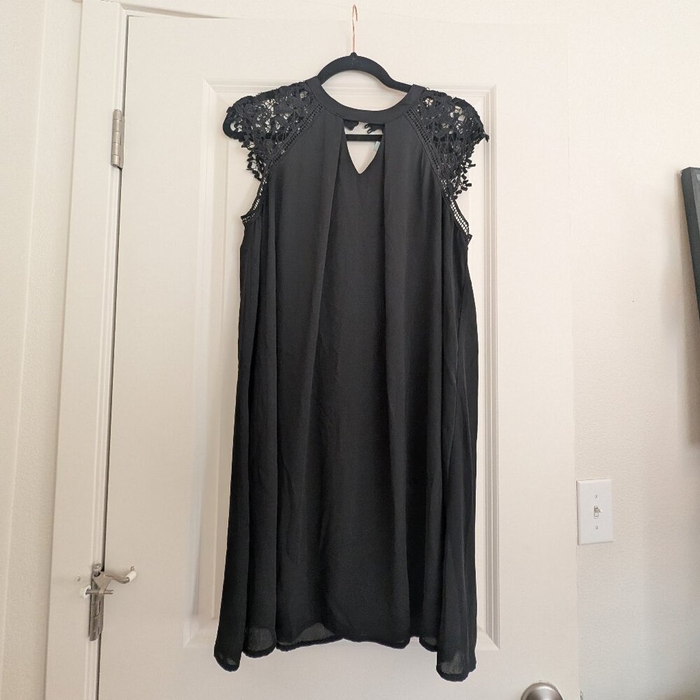 Black cap sleeve swing dress